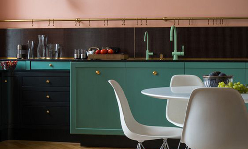 This pink, teal and black kitchen is full of contemporary style.