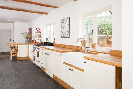This one-wall traditional kitchen has been painted in Farrow & Ball's Wimborne White.