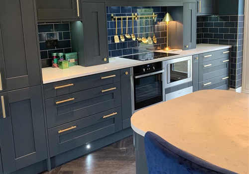 This cabinets in this kitchen have been painted in Farrow & Ball’s Hague Blue.
