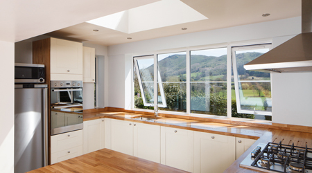 The location of this G-shaped kitchen benefits from the fantastic view.