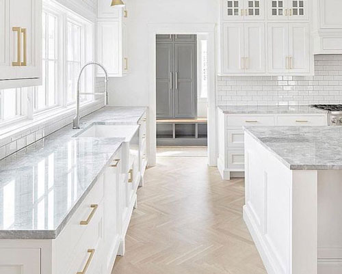 Marble worktops are perfectly suited to kitchens with a light colour palette.