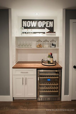 Compact and efficient, this kitchenette doubles up as a personal bar.