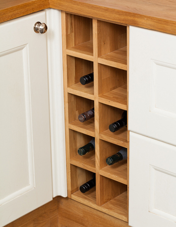 This solid oak wine rack base cabinet integrates seamlessly into your kitchen and holds up to ten bottles of wine.