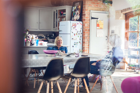 Jo Whiley and a friend in her large kitchen