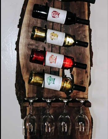 This live edge wine rack has been made by Raws Custom Shop from Ohio walnut slab and black metal wire.