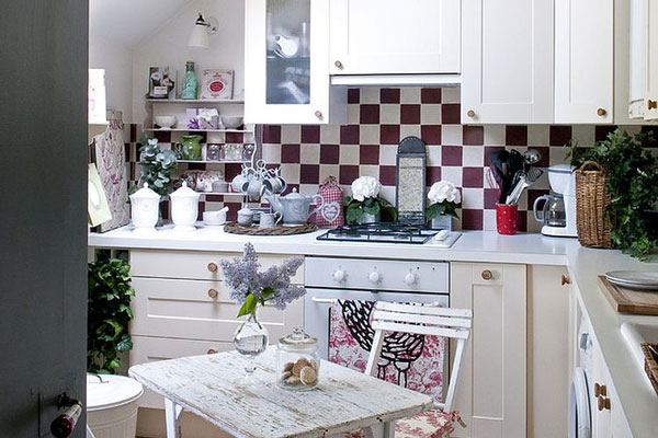 A traditional design has been used in this bijou attic kitchen