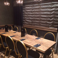 Here, a worktop has been used to create a large dining table for a restaurant.