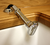 This pull-out spray mixer tap is particularly useful in a utility area as it allows greater flexibility