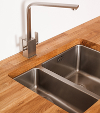 An Undermounted Sink for Oak Kitchens.
