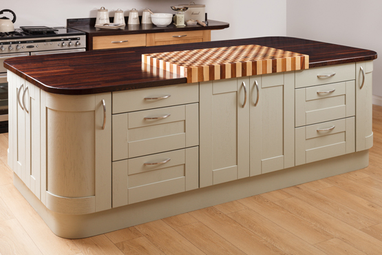 Wenge kitchen island with mizzle solid oak kitchen cabinets.