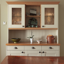 Farrow & Ball's Lime White provides a beautiful finish to these Shaker-style wood cabinets.