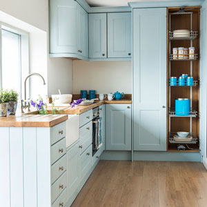 Farrow & Ball’s Lulworth Blue has been used for these cabinets, creating a fresh look that provides a quick kitchen update