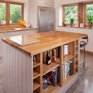 Lacquered open units are a great way to make a feature of crockery and recipe books solid oak kitchen cabinets.