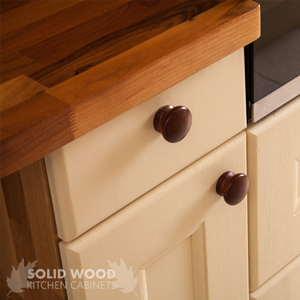 Solid walnut worktop with Farrow's Cream traditional cabinet doors.