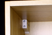 How to Fit a Kitchen: Hook the wall cabinets onto the brackets