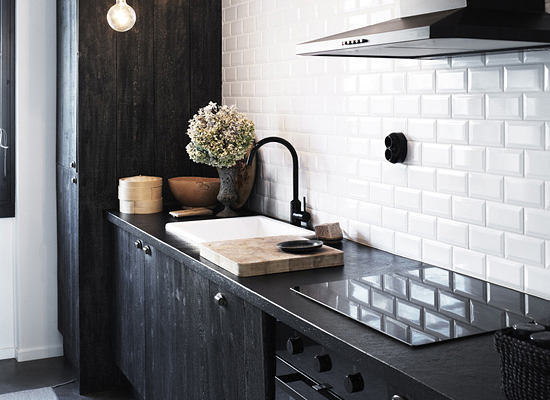 The trend for industrial kitchens has increased the popularity of darker cabinets