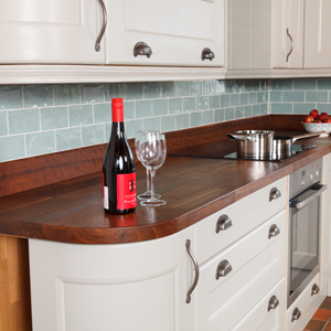 These light cabinets are the perfect contrast for richly coloured deluxe American walnut worktops