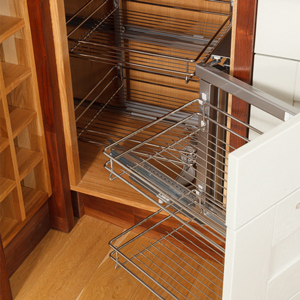 Magic Basket Corner Solution Pull-Out wirework makes it easy to access items in hard-to-reach corners for solid oak kitchens.