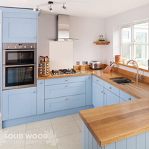 These oak cabinet frontals painted in Farrow & Ball’s Lulworth Blue are a great choice for a retro solid wood kitchens makeover.
