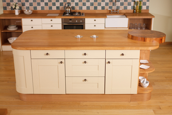 These oak cabinet frontals are painted in Cord by Farrow & Ball and look lovely paired with oak worktops.