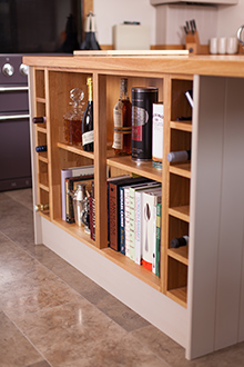 Open shelving units in oak kitchens is ideal for storing recipe books close to hand