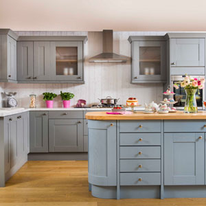 Pale blue paint adds style to an otherwise neutral kitchen for a country feel
