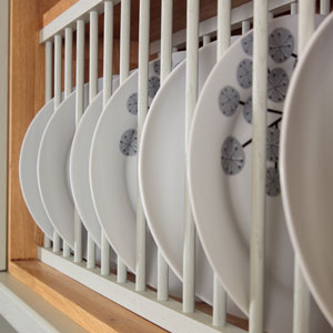 Plate racks are a practical choice that look great in a traditional kitchen