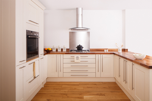 These Shaker frontals are painted in New White contrast nicely with the walnut worktop.