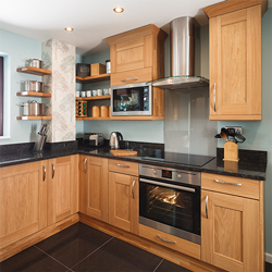 Shaker lacquered oak cabinets make a beautiful feature in oak kitchens.