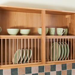 Solid oak plate racks provide both attractive and convenient storage for crockery