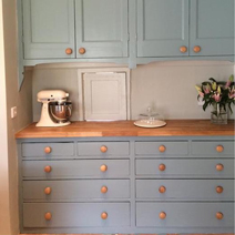 Team solid oak worktops with Farrow & Ball's Oval Room Blue for a gorgeous colour contrast.