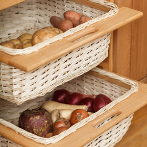 Wicker baskets are both an attractive and practical storage solution solid oak kitchen cabinets.