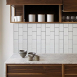 Vertical subway tiling enhances the height of your kitchen oak kitchens.
