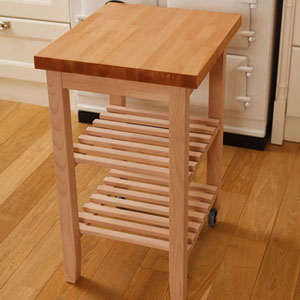 A wooden kitchen trolley in a country kitchen