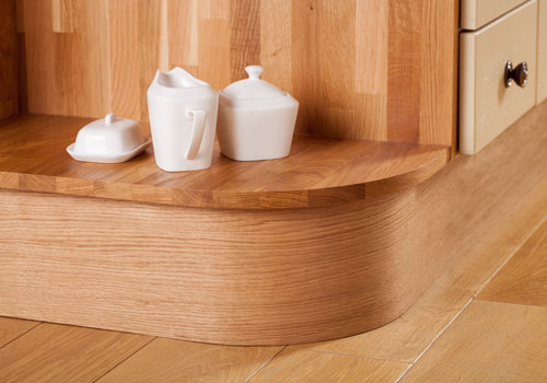 This solid oak curved plinth is perfect for finishing the bottom of a kitchen base cabinet.