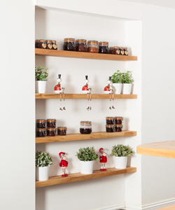 If you do not have space for a larder or pantry, open shelving is a good alternative.