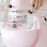 Ideal for making all types of bakes, this pale pink KitchenAid mixer makes the perfect gift.