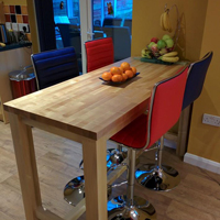 This taller dining table is perfect for families of four.