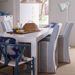 Incorporate fabrics with seaside stripes to make every day a holiday in your solid wood kitchen.