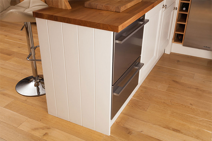 Solid Wood Kitchen Cabinets, Can Laminate Flooring Be Installed Under Kitchen Cabinets