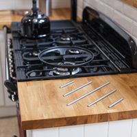 It is wise to check up on your kitchen fitter's credentials for installing appliances in solid wood kitchens.
