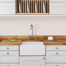 Matching wooden plinths and cabinet frontals create a uniform finish solid wood kitchens.